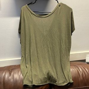 Express shirts one in green and pink has a knot on the back of shirt on bottom